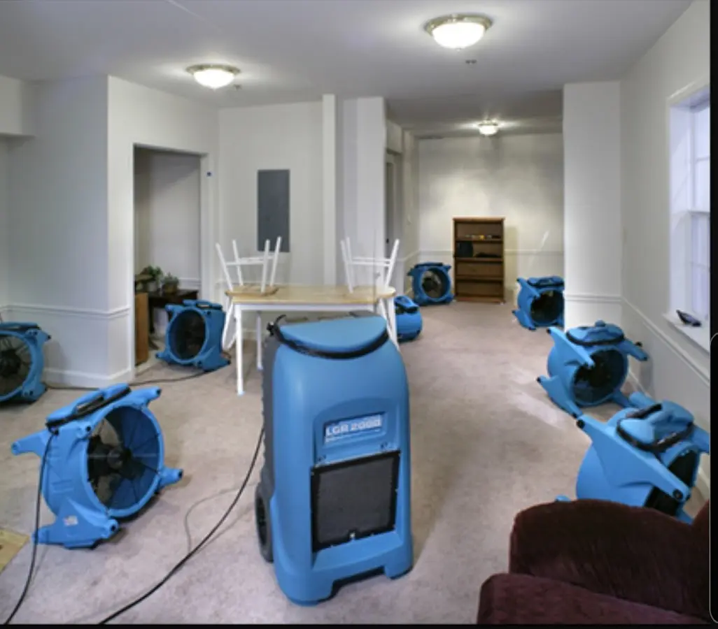 Air movers and dehumidifier setup for Water Damage Restoration in Clairton
